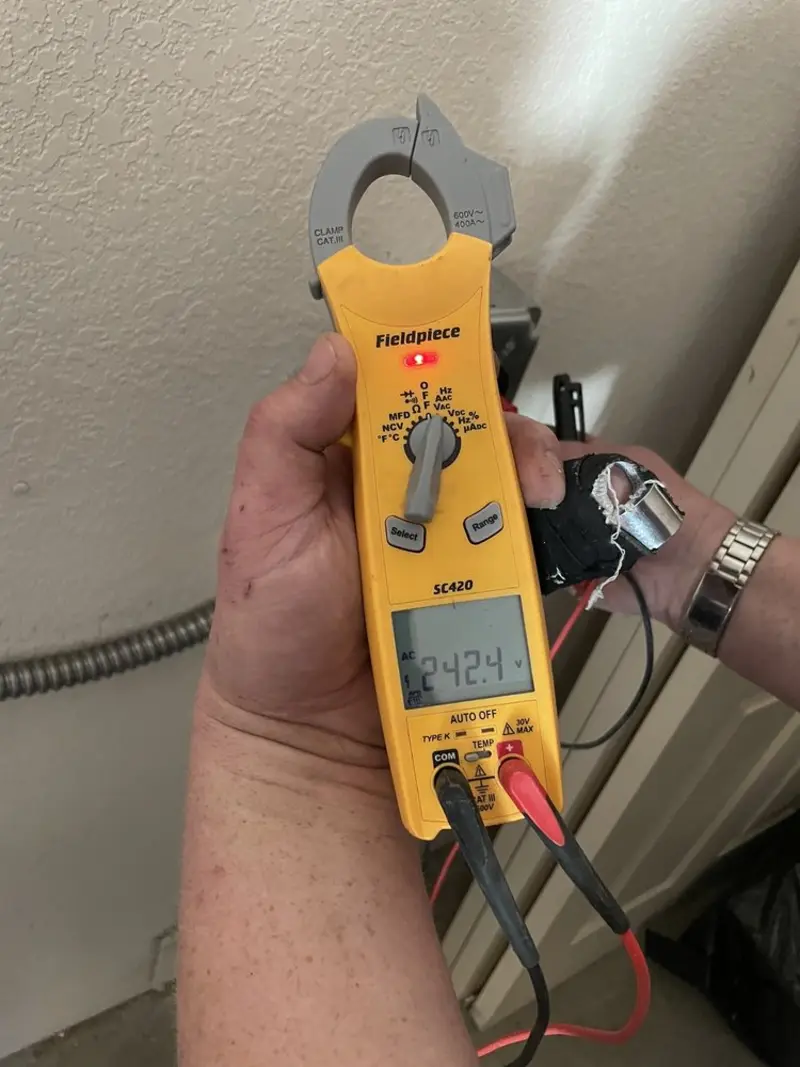 Voltage testing with clamp meter during Circuit Breaker Repair in Massillon